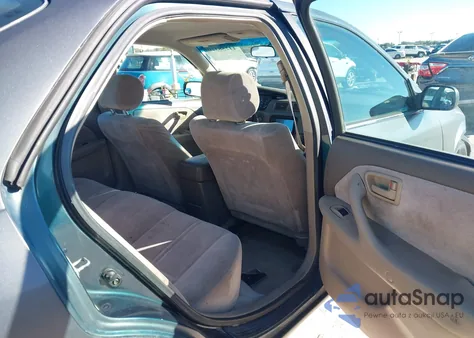 1998 Toyota Camry Le z USA, uszkodzony, nr VIN JT2BG22K9W0127068